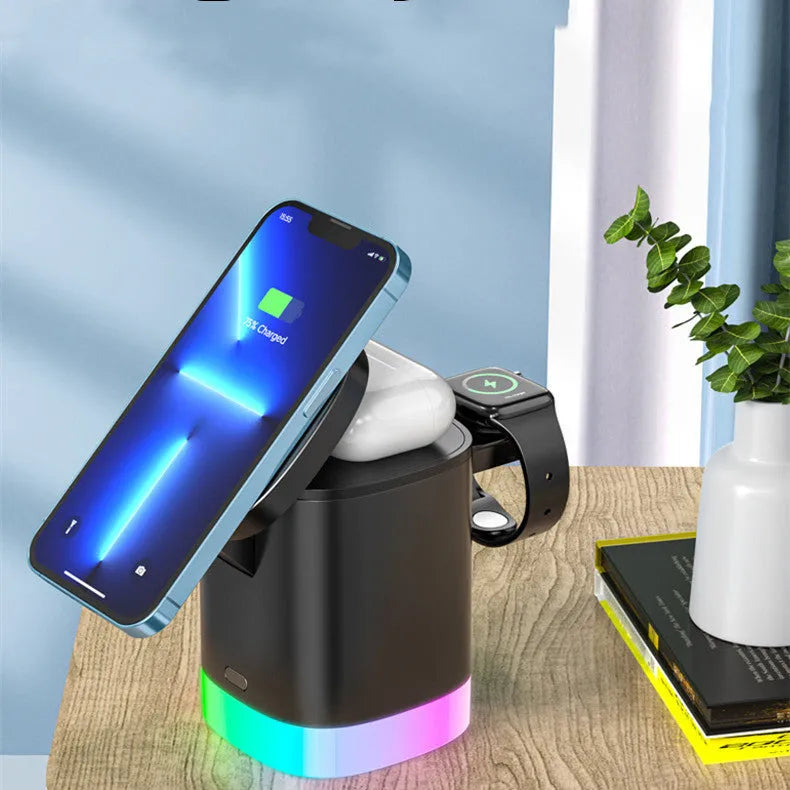 Black foldable 3-in-1 magnetic wireless charging station with RGB lighting charging iPhone, Apple Watch, and AirPods