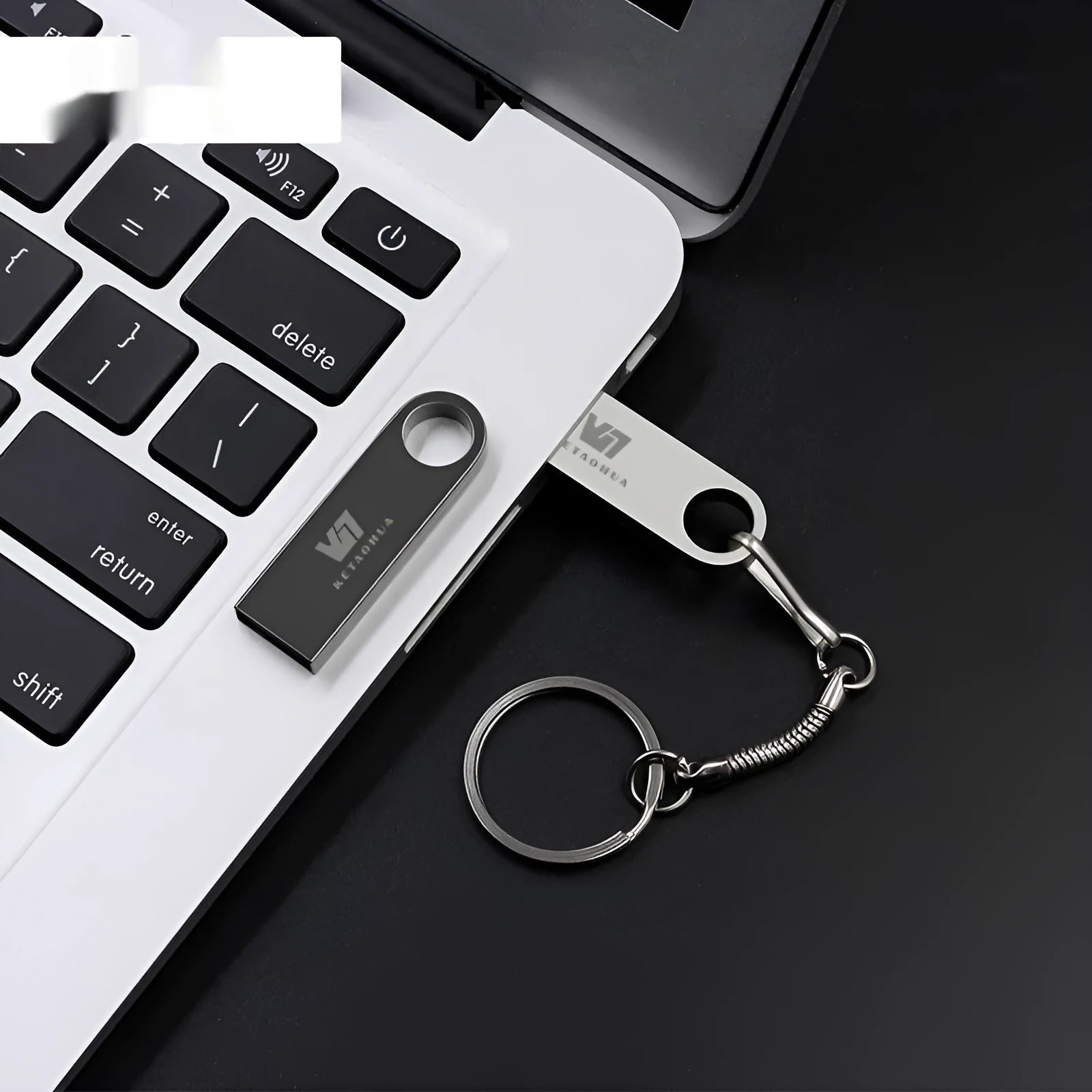 Metal USB car flash drive in black colour showing compact design with USB 2.0 connector