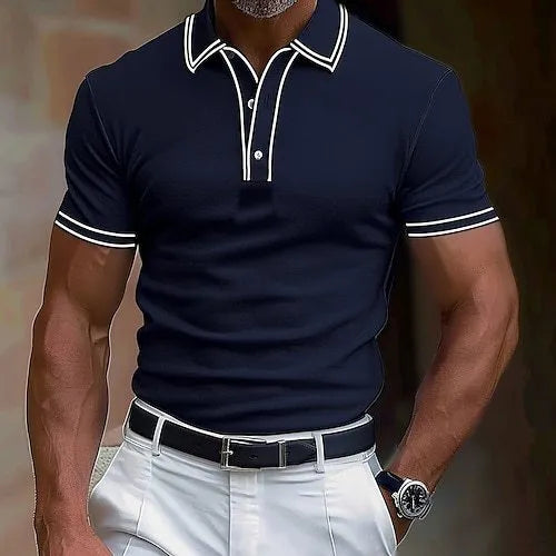Man wearing a loose-fit striped short-sleeve t-shirt in a casual setting.