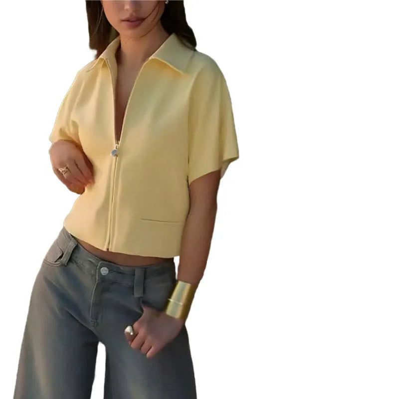 Model wearing a loose-fit short sleeve casual top in yellow damascus style.