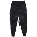 Black 100% cotton overall trousers with tapered leg, front view, on a plain background.