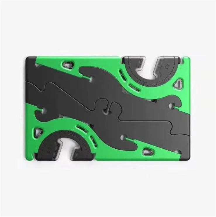 Plastic card type mobile phone holder in various colours on a desktop.