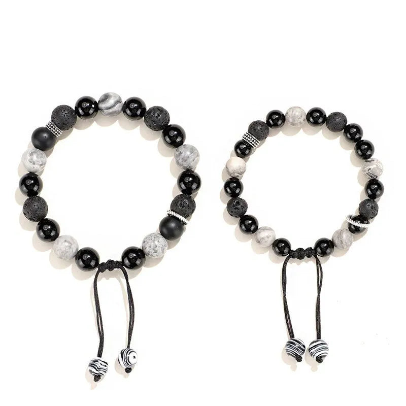 Black agate map stone and volcanic rock bracelet with diamond clasp in 8mm and 10mm sizes.