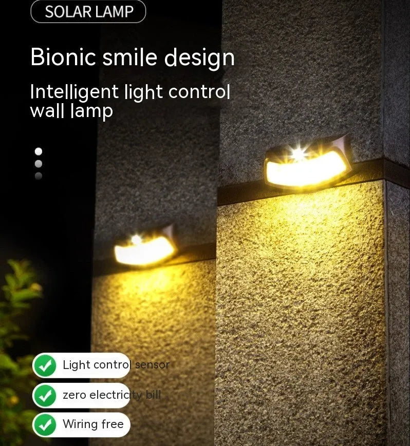 Solar-powered smiling face outdoor wall lamp with warm or white light options.