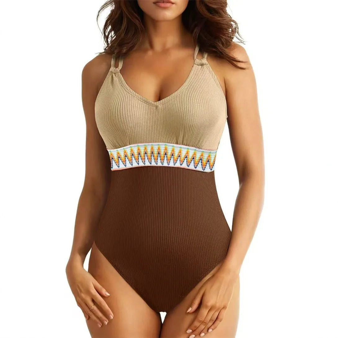 Solid colour one-piece nylon rib fabric swimsuit with panel stitching for women