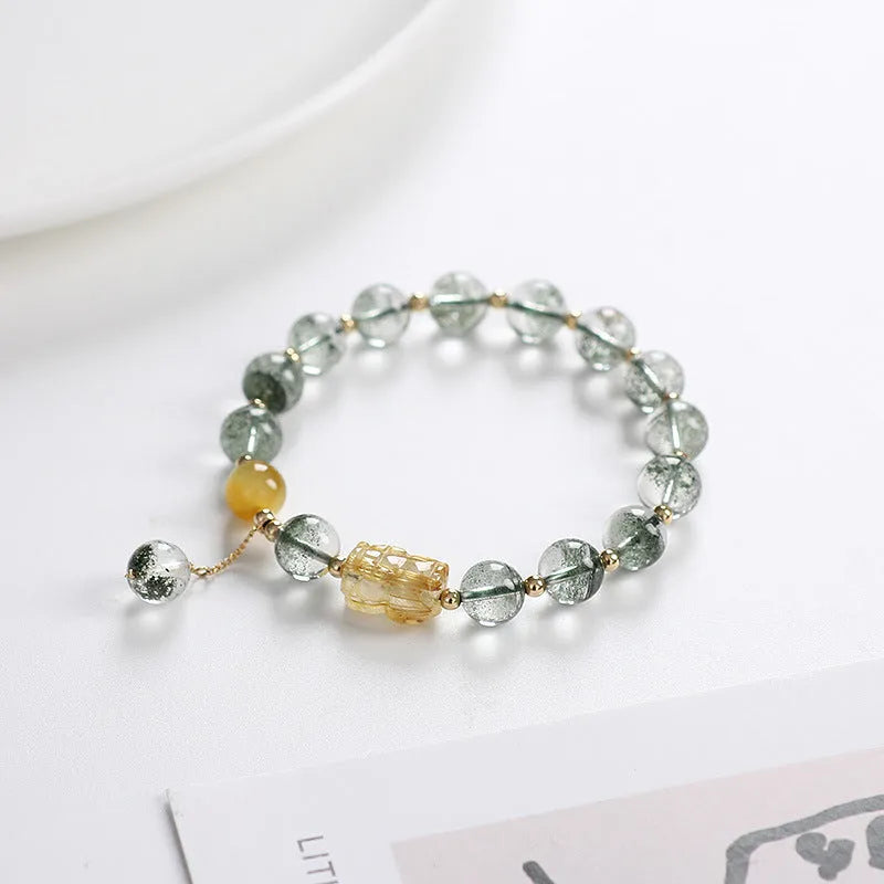 Green phantom quartz crystal bracelet with 8mm beads and gold rutilated quartz inclusions