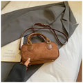 PU bowling bag in black, brown, coffee or green with optional pendant, horizontal square shape and single strap.