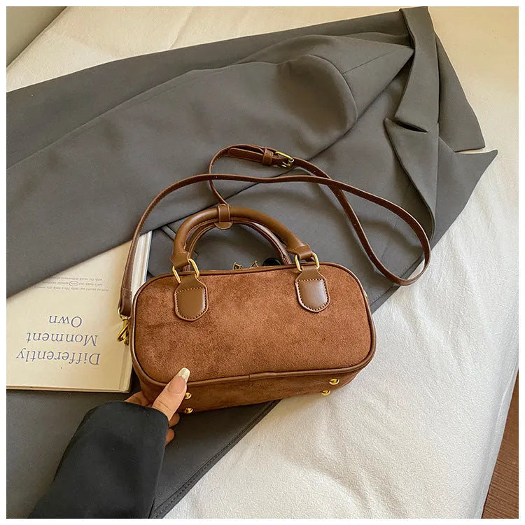 PU bowling bag in black, brown, coffee or green with optional pendant, horizontal square shape and single strap.