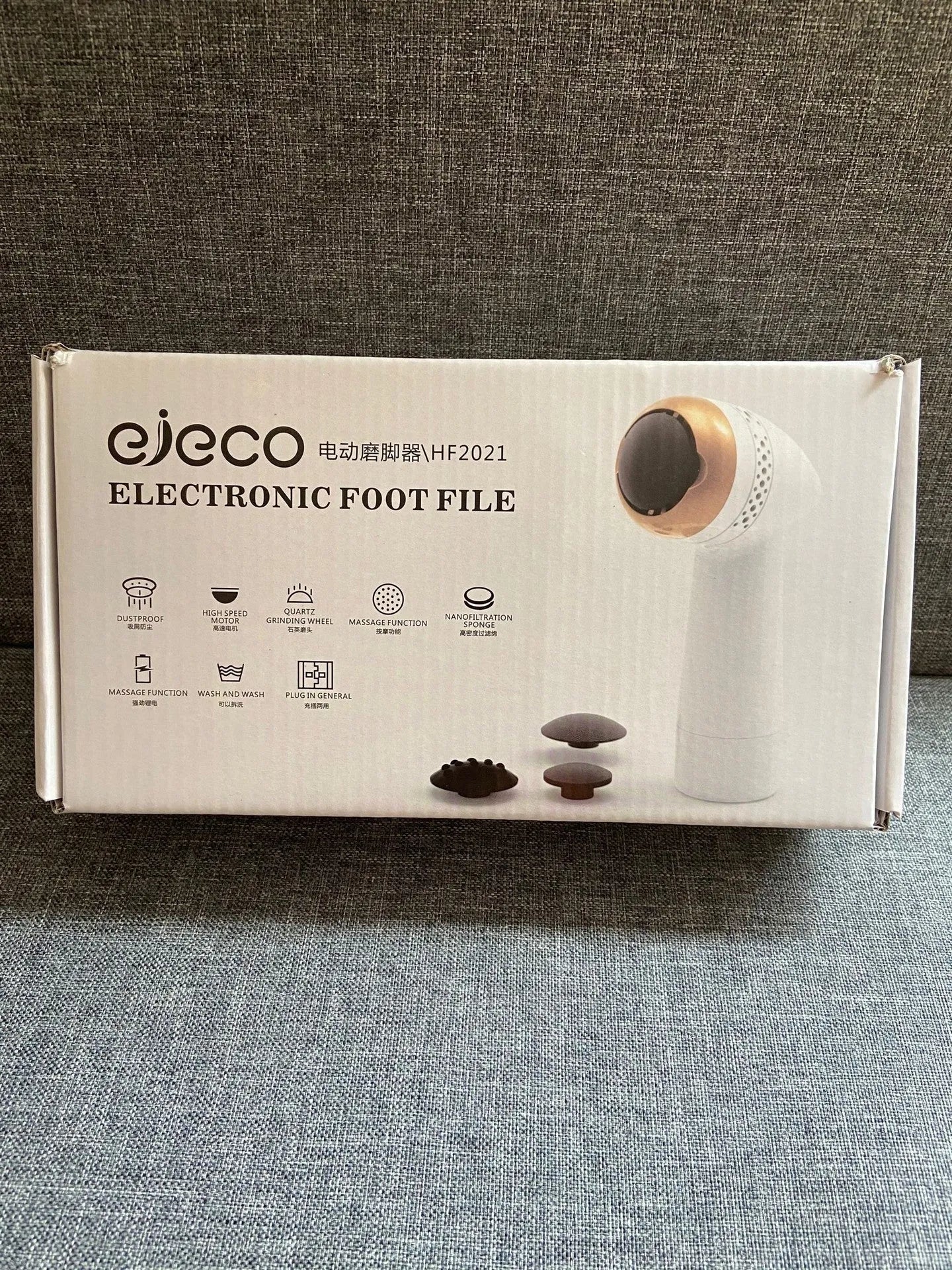 Gold-coloured electric vacuum foot grinder with a refined quartz grinding head on a white background.