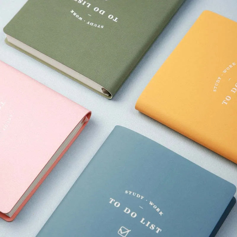Simple Style A6 notebook with PU cover in four colour options showing 96 pages of eye protection writing paper