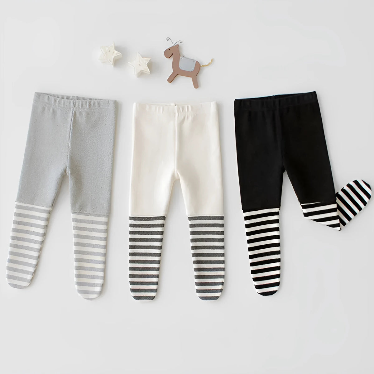 Girls stitched striped tights, middle waist, trouser length, available in Black, Grey, and White, sizes 66cm to 90cm