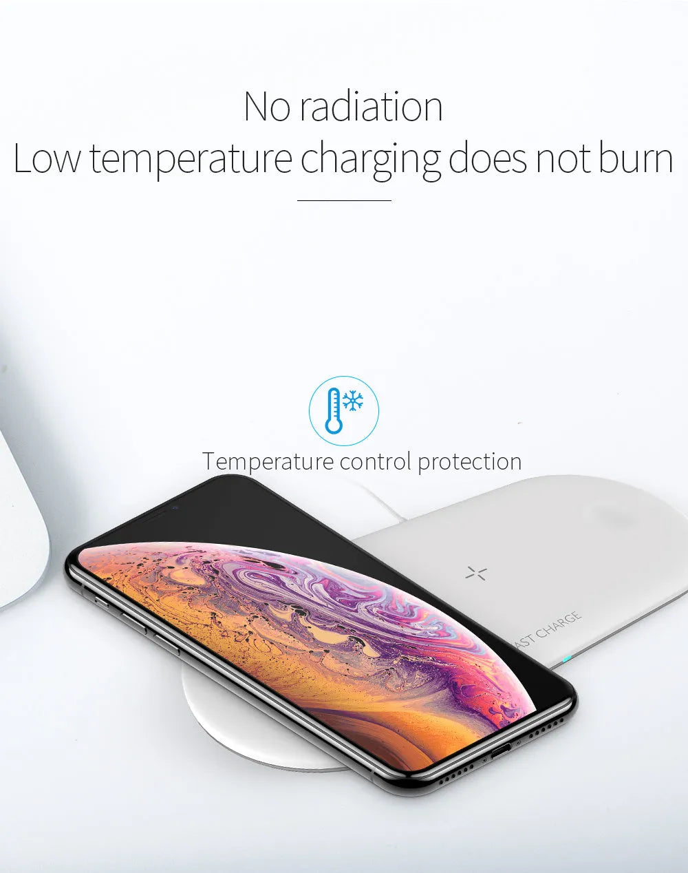 Black three-in-one wireless charging station for Apple Watch, iPhone, and headphones on a desk.
