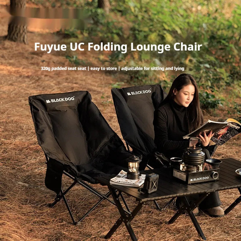 Night black portable folding moon chair in Oxford cloth for outdoor camping and beach use.