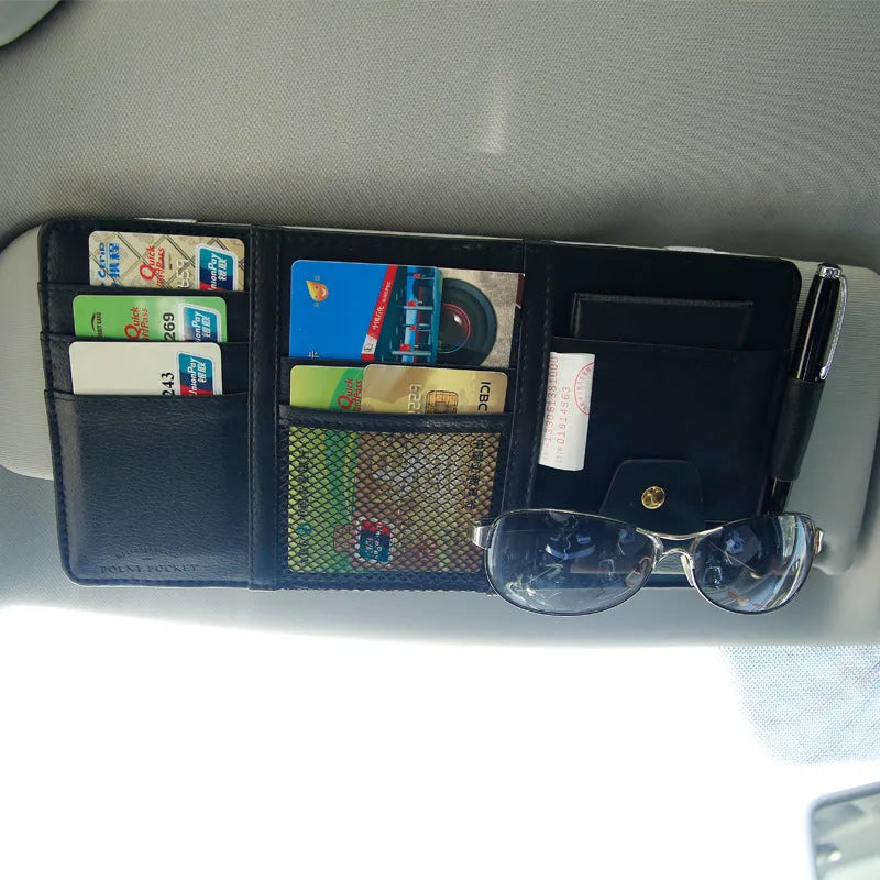 PU leather car sun visor clip organiser in black, grey and beige with slots for phone, sunglasses, CDs, and documents.