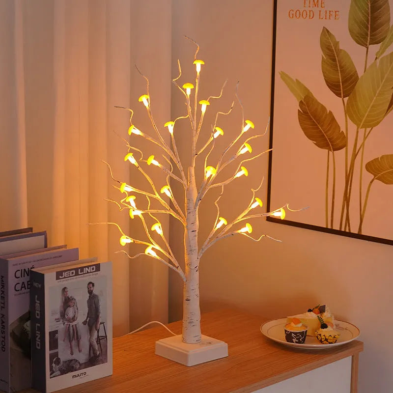 60cm tall white birch tree LED lamp with small red detachable mushroom flowers on a table.