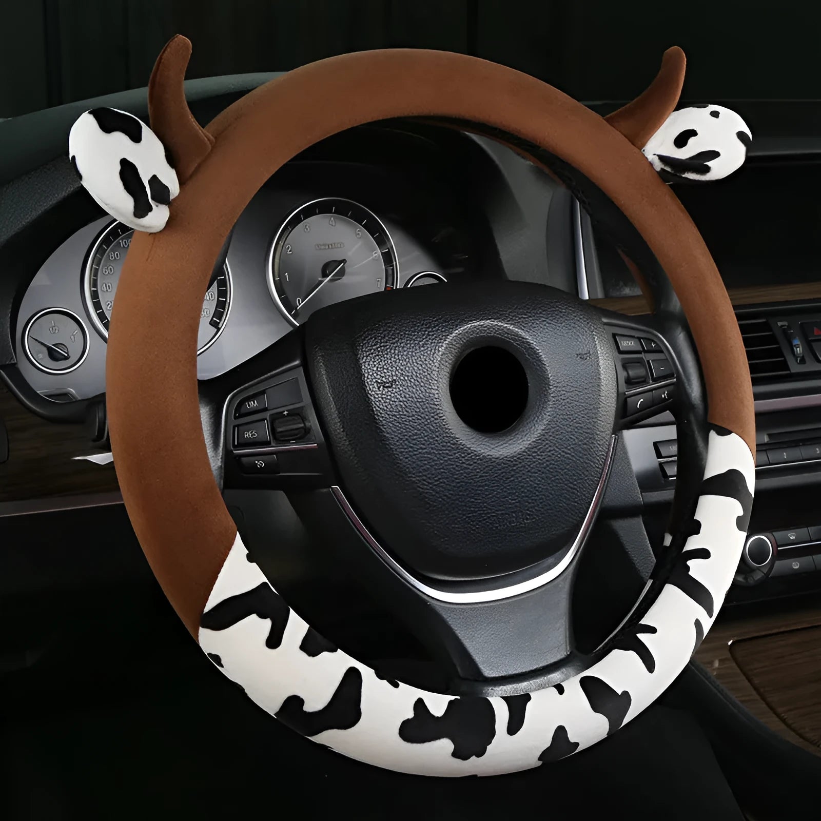Black plush steering wheel cover with protective handle on car steering wheel
