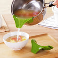Green silicone soup funnel kitchen gadget showing flexible food-grade material and clip-on design