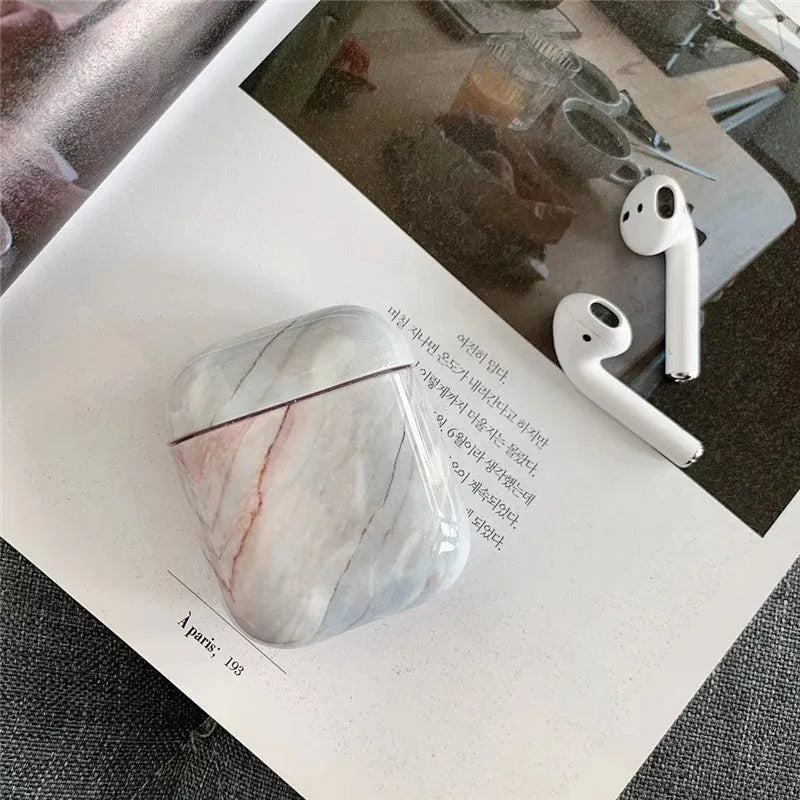 White marble hard PC protective case cover for Apple AirPods 1 and AirPods 2 wireless earphones.