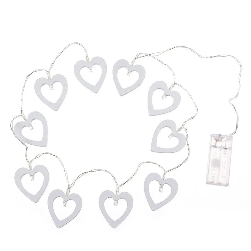 Wooden love lantern string with warm white LEDs on a USB battery cable