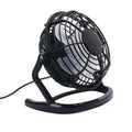 Small black and white USB desktop fan with adjustable stand on a desk next to a laptop.