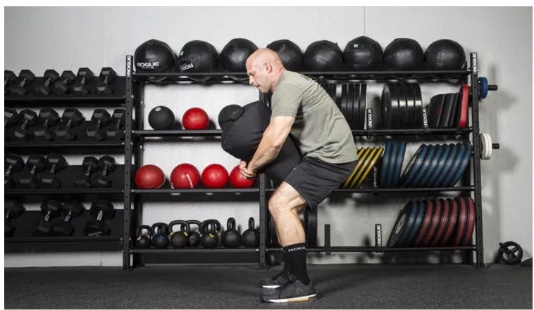 Black cylinder strongman sandbag with heavy duty 1000D nylon and YKK zipper for cross training