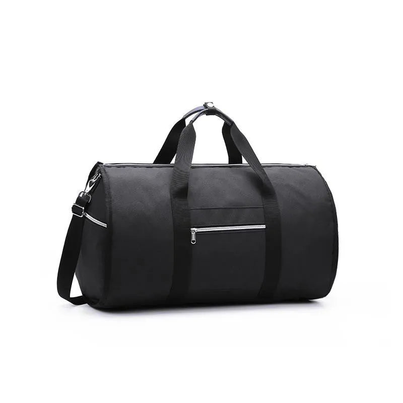 Medium sized cylinder travel bag in black Oxford cloth, showing zipper opening and internal pocket.