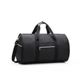 Medium sized cylinder travel bag in black Oxford cloth, showing zipper opening and internal pocket.