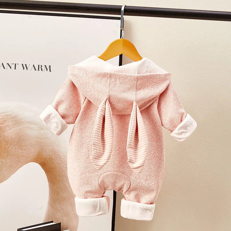 Pink little bee print baby jumpsuit with long sleeves, single-breasted front, on white background
