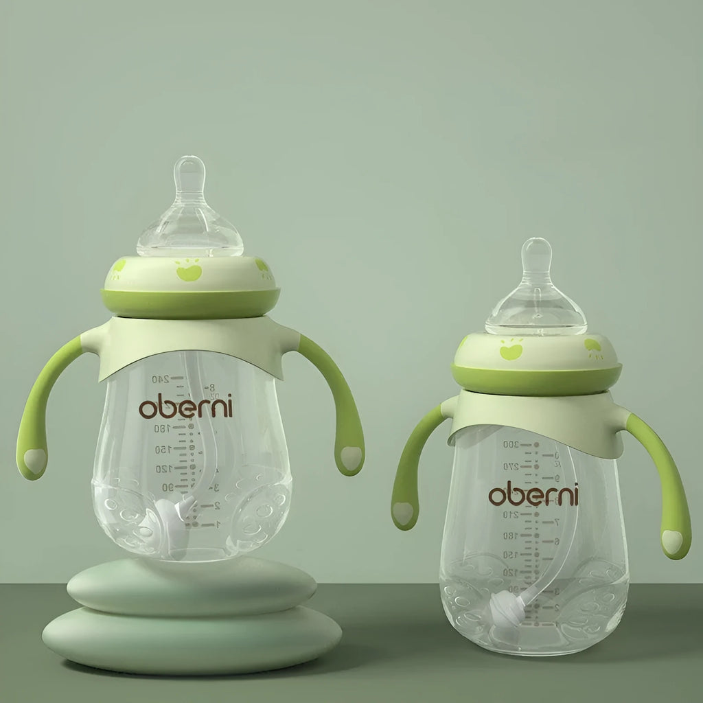 Blue wide caliber baby bottle with handles showing 240ml capacity marking