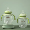 Blue wide caliber baby bottle with handles showing 240ml capacity marking