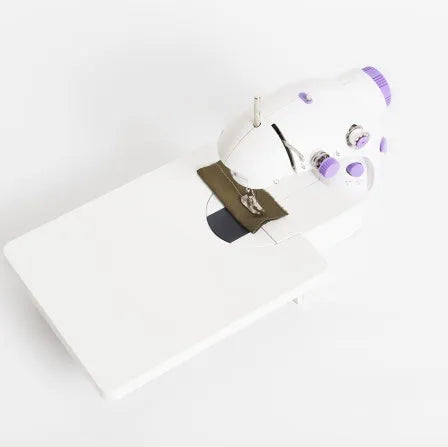 Electric mini household sewing machine with compact 20cm dimensions and multiple plug options