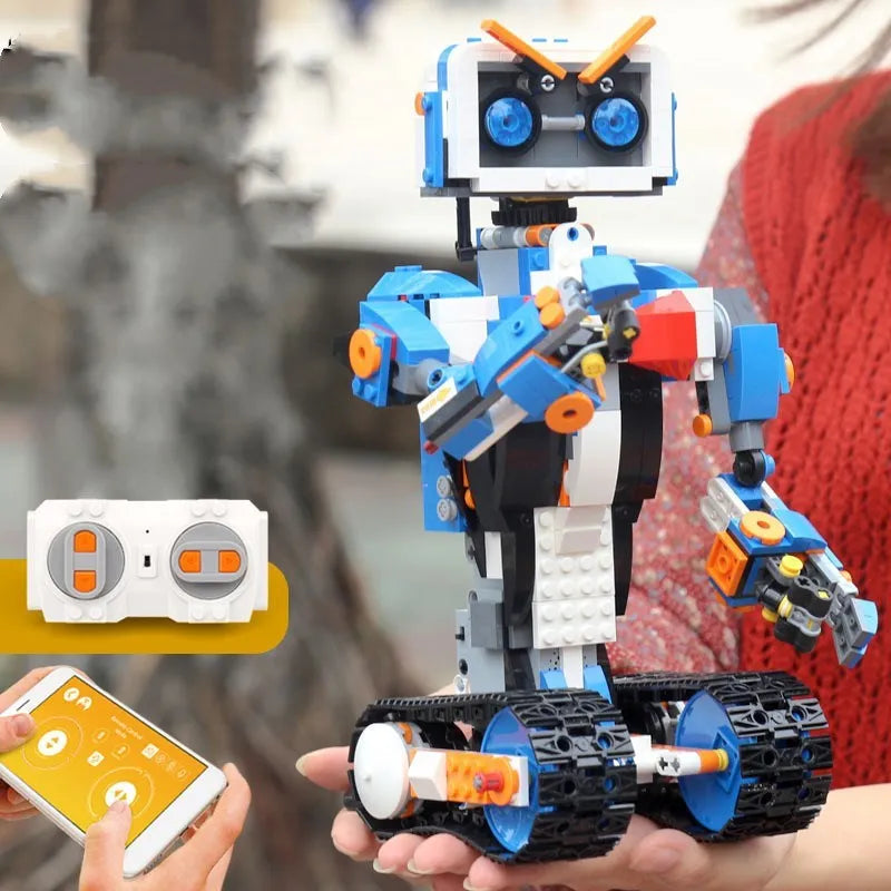 Puzzle plug-in assembly building blocks STEM toy with 400-800 ABS plastic pieces and USB battery power in colour box packaging