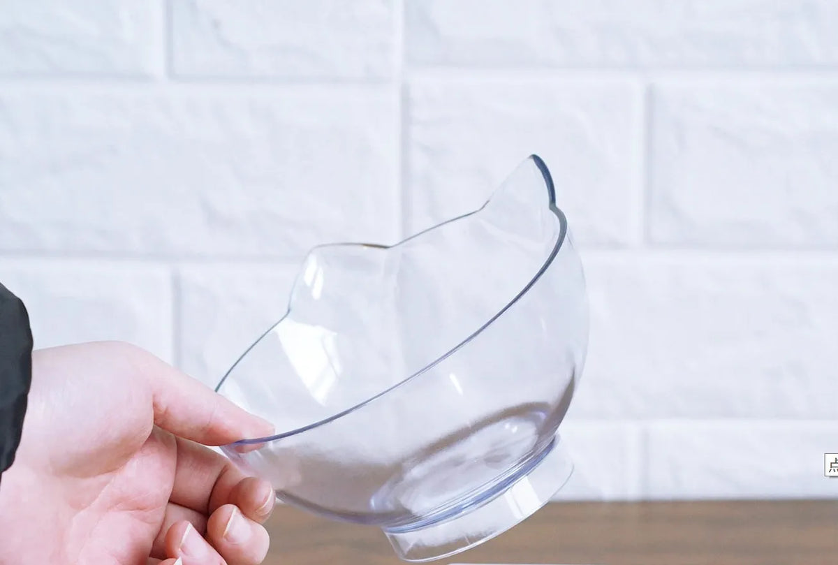 Inclined transparent PC plastic cat food bowl with tilted oblique mouth and optional ABS base