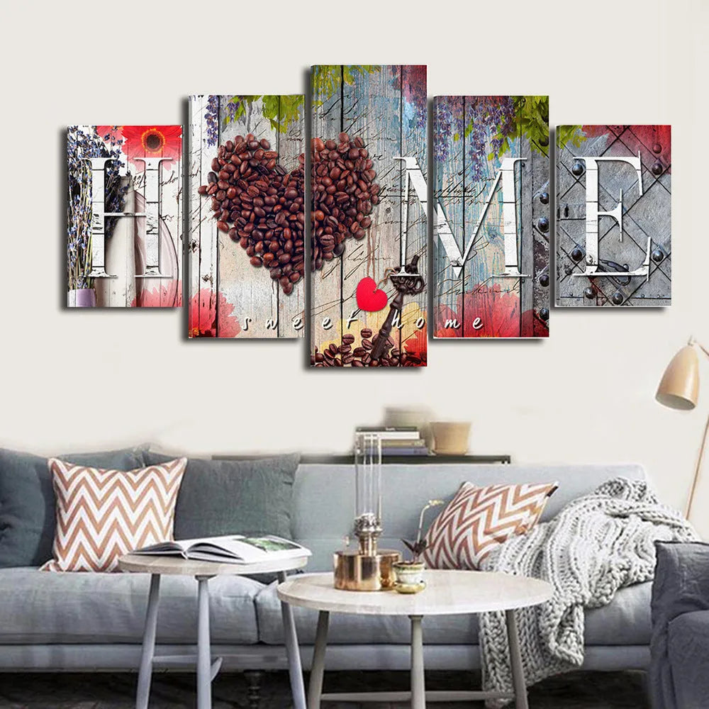 Set of five red unframed oil painting canvases in various sizes for wall decoration.