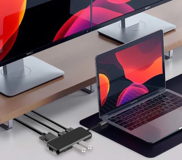 9in1 USB hub with dual HDMI, VGA, and Gigabit Ethernet ports on a desk