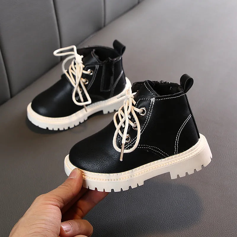 Boys leather short boots with synthetic upper and rubber sole in beige colour, side view