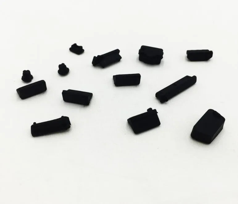 13-piece silicone dust plug set for laptop ports in multiple colours including transparent and black