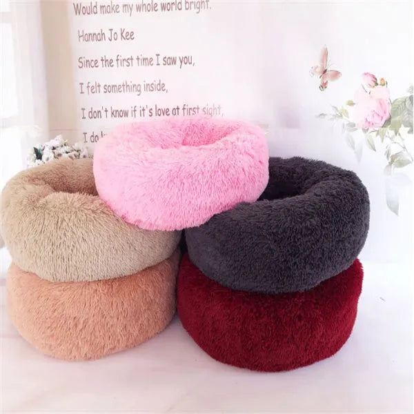 Round long hairy cat bed in plush fabric with anti-slip bottom for autumn and winter