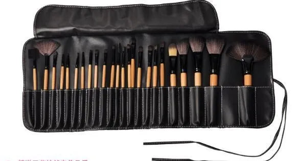 24 professional makeup brushes with wooden handles in a black PU gift bag