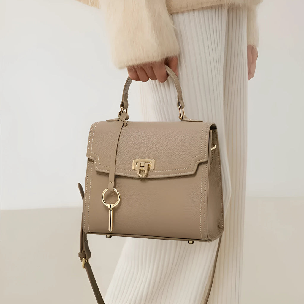 Elephant grey genuine leather handbag with vintage lock and crossbody strap