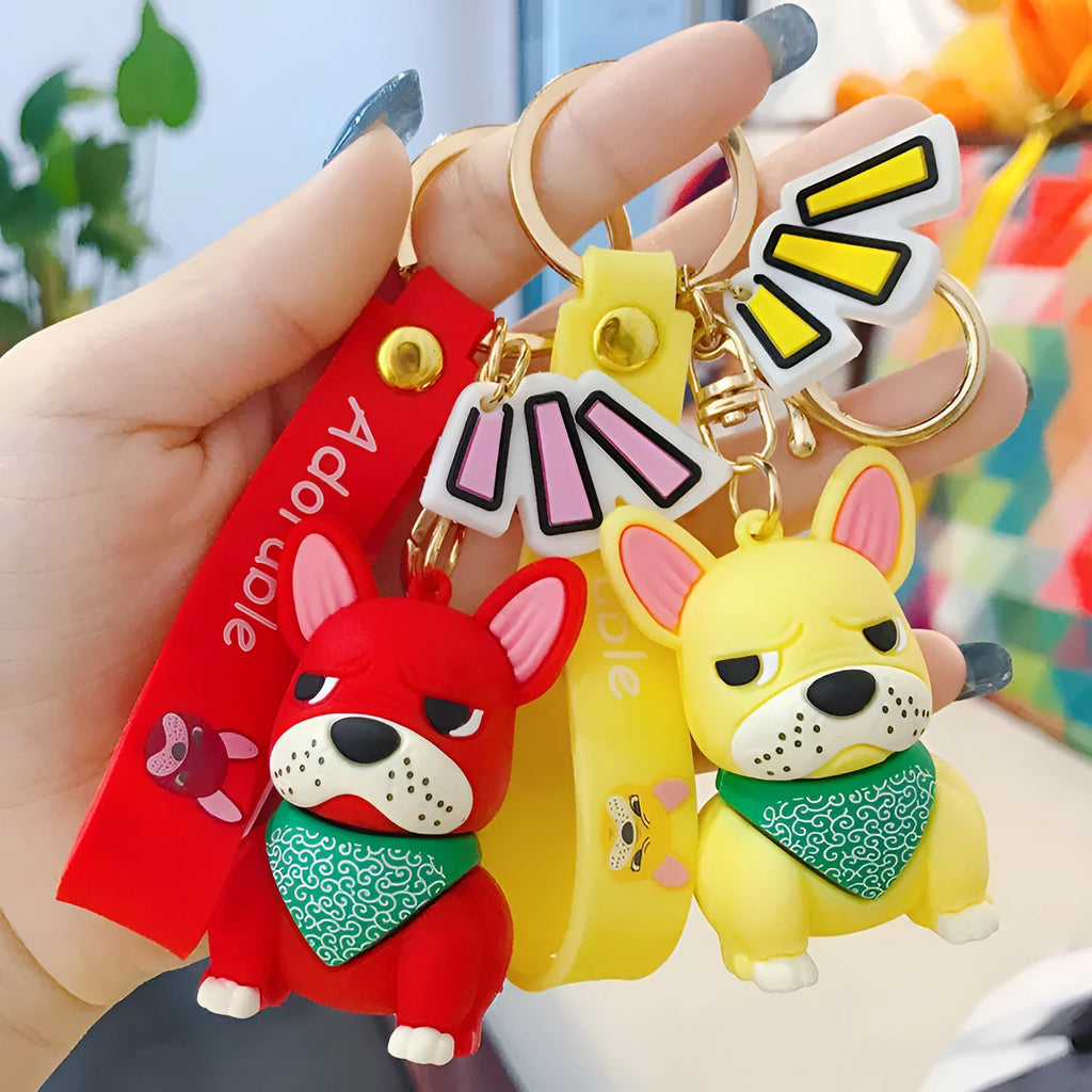 Tide Brand French keychain with metal pendant and PVC body in red, yellow, and grey bucket styles.