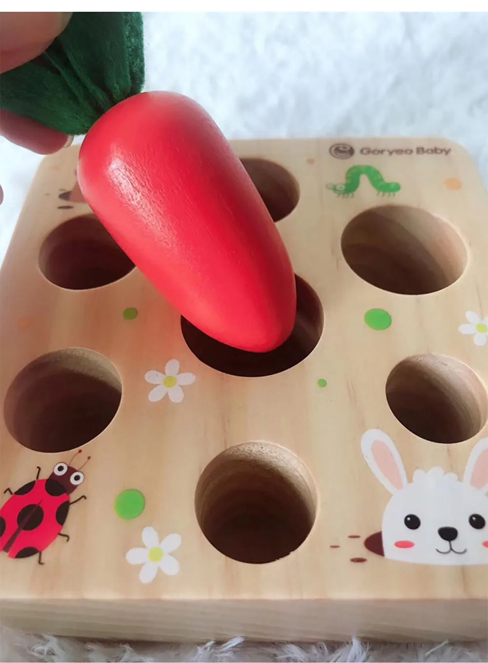 Wooden educational toy shaped like harvest carrots for toddler cognitive development.
