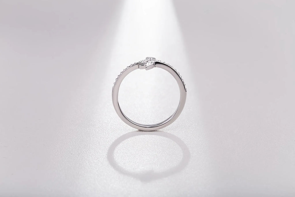 Women's arrow feather ring with white copper plating and cubic zirconia, available in US sizes 5-8