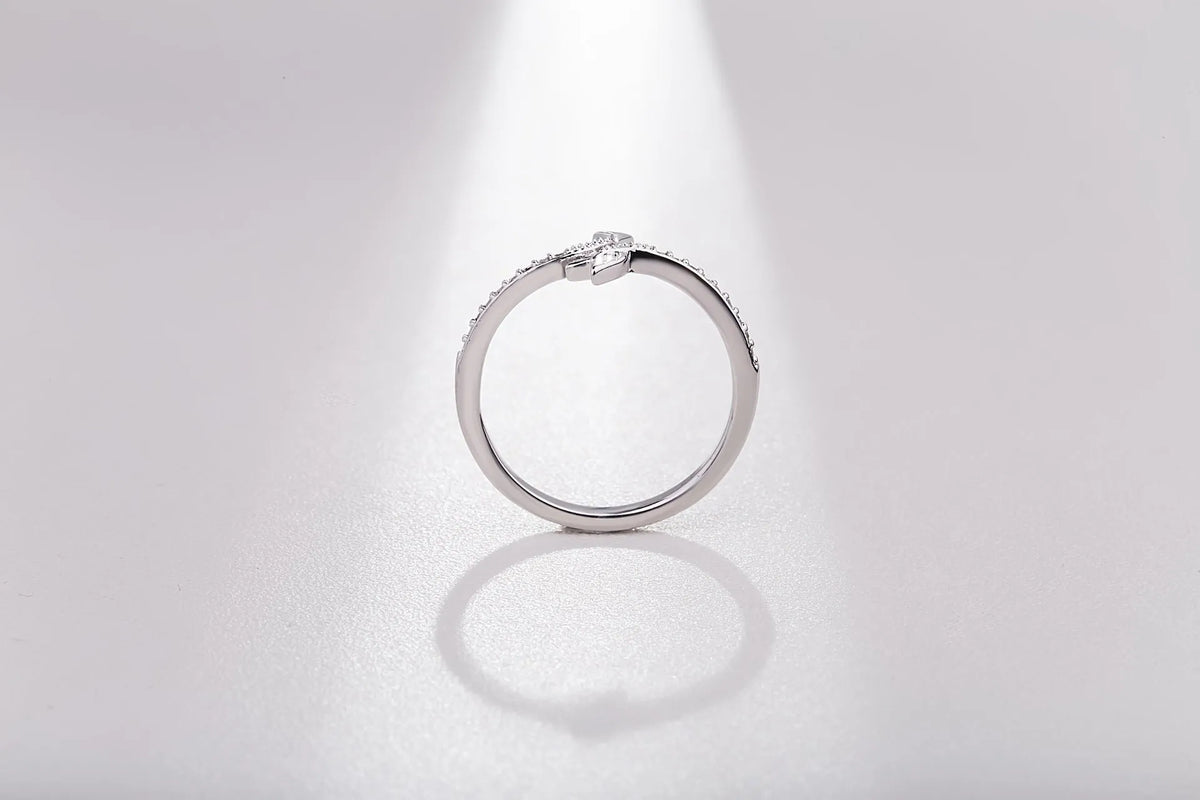 Women's arrow feather ring with white copper plating and cubic zirconia, available in US sizes 5-8