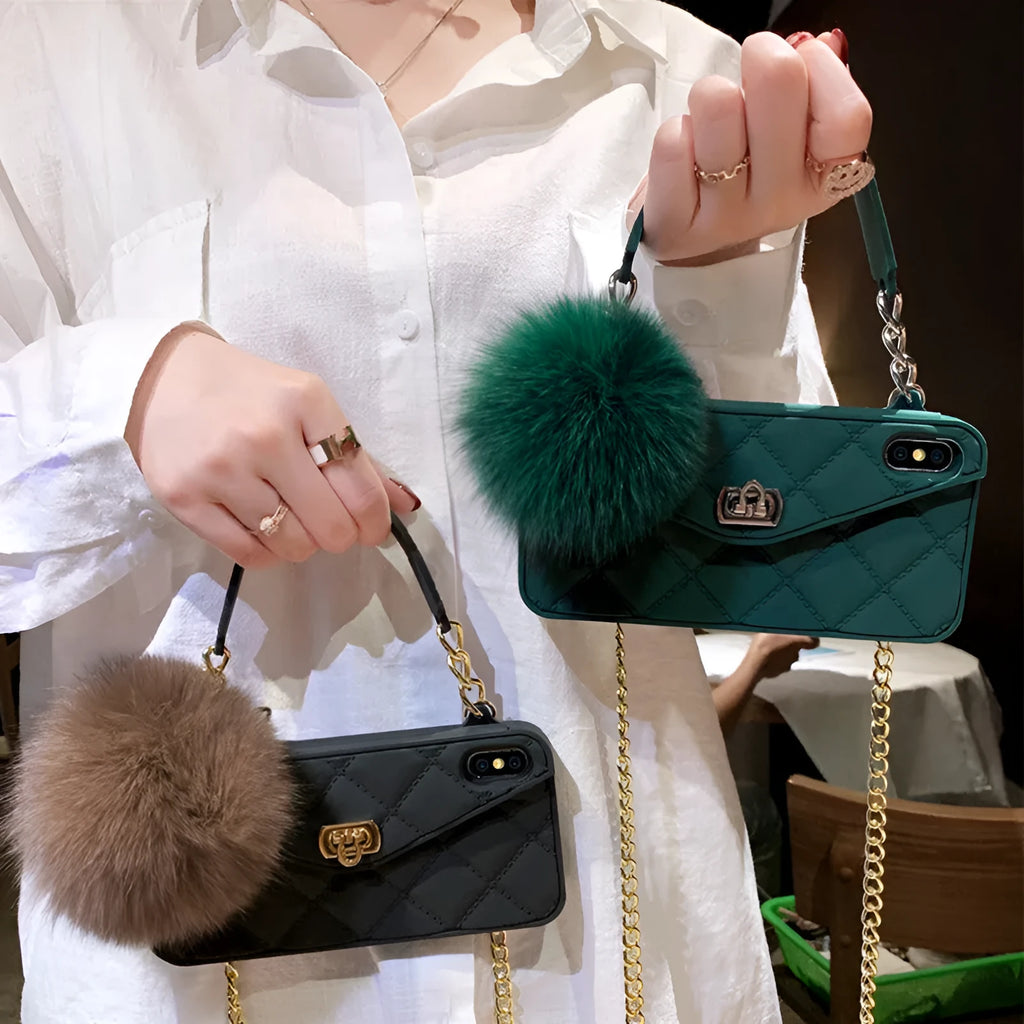 Soft plush hairball phone case with a grid pattern for iPhone, shown in dark green.
