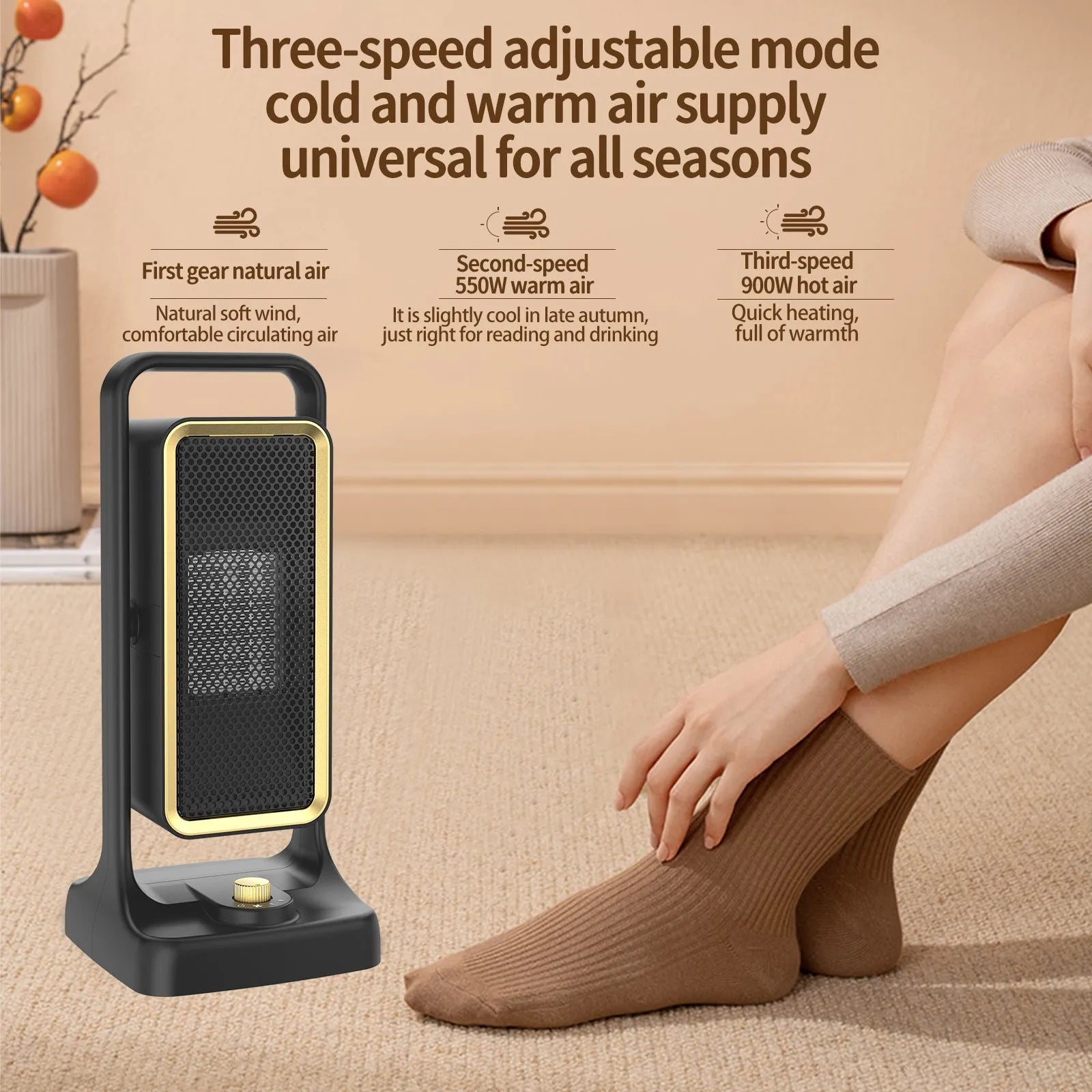 Black portable PTC ceramic desktop fan heater on a wooden desk.