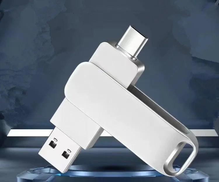 Rotating metal USB flash drive in black showing both USB connector and Type-C interface