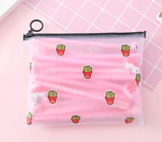 Set of 20 black 0.5mm cartoon design pens next to a 21x17cm cactus-themed plastic pencil case.