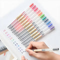Muji 12-piece gel pen set with 0.5mm tips, showing transparent barrels with coloured ink and caps.