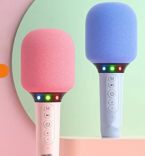 Bluetooth children's handheld karaoke microphone with built-in speaker in pink and white finish